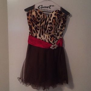 Cocktail dress with animal print and ruffled skirt
